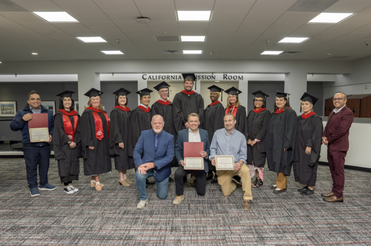 GPPM 2025 Graduates in front of California Mission Room